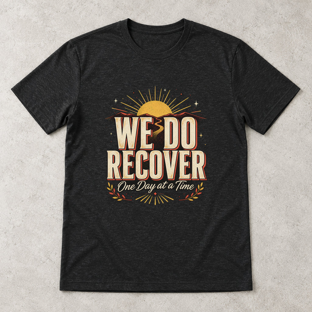 AI flat-lay mockup of the black We Do Recover graphic T-shirt from Recovery Merch.