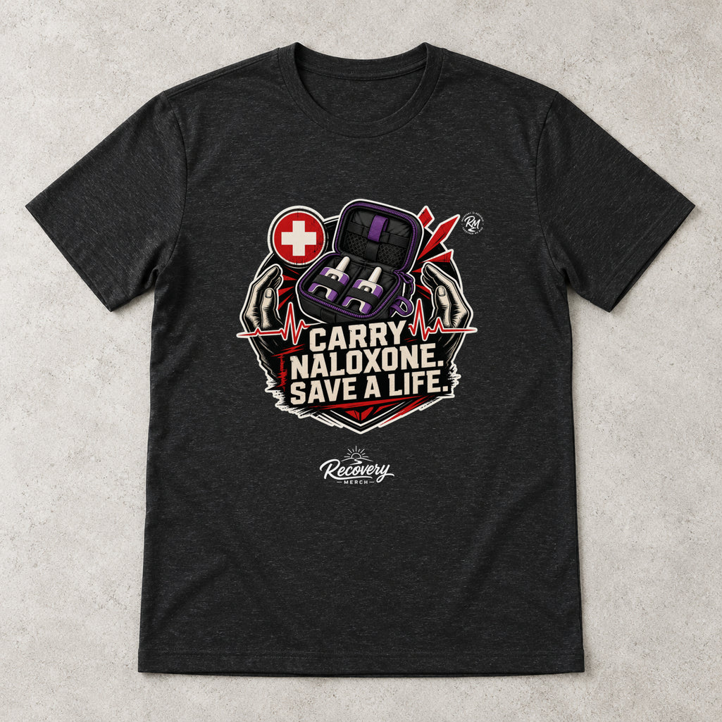 AI flat-lay mockup of the black Carry Naloxone Save A Life graphic T-shirt from Recovery Merch.