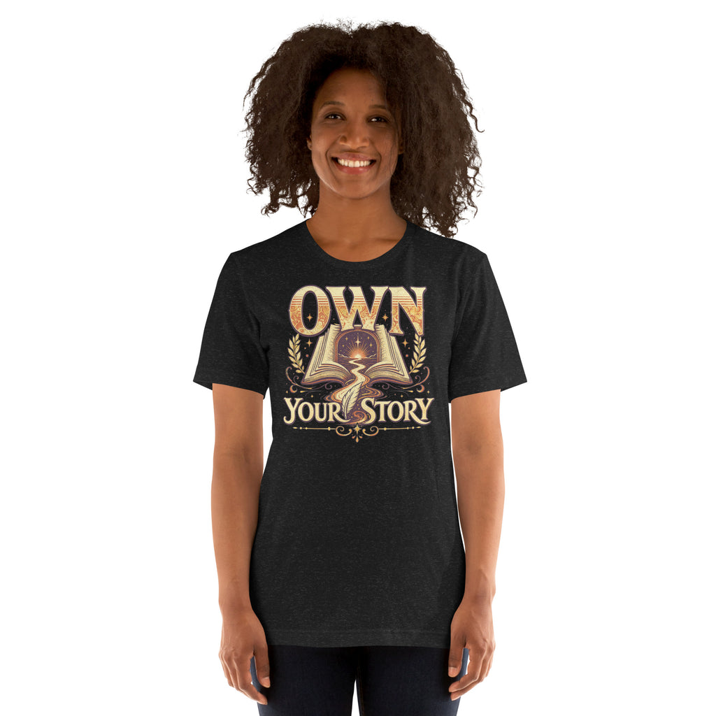 Woman wearing the Black Heather Own Your Story T-shirt with the existing artwork.