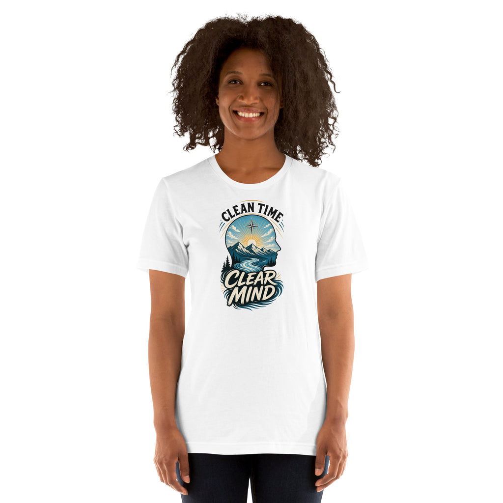 Woman wearing the White Clean Time Clear Mind T-shirt with mountain and sunrise artwork.