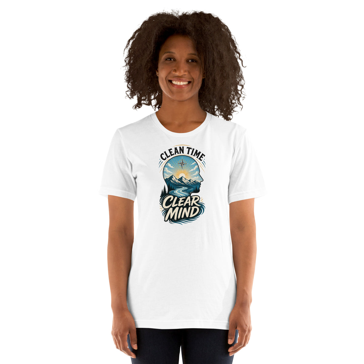 Woman wearing the White Clean Time Clear Mind T-shirt with mountain and sunrise artwork.